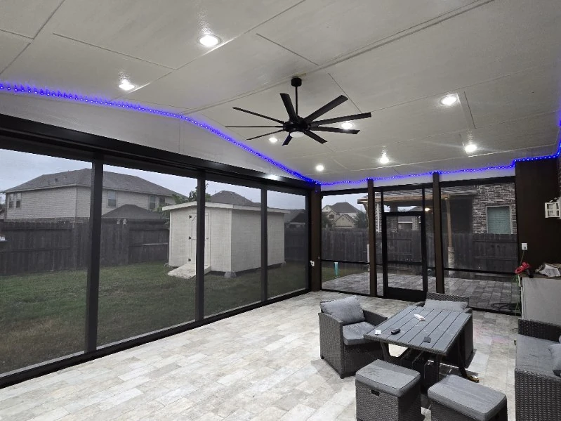 Retractable awning extended over a poolside patio
