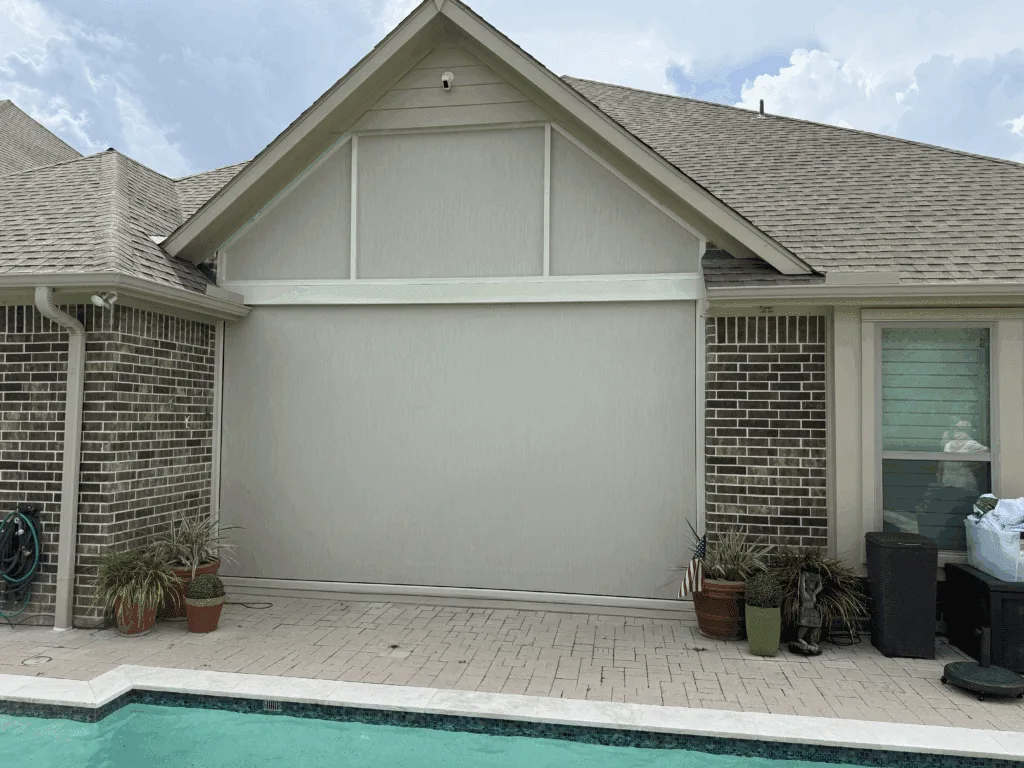 Patio enclosed with motorized screens and bug protection