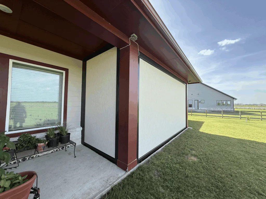 Outdoor living space with retractable patio screen
