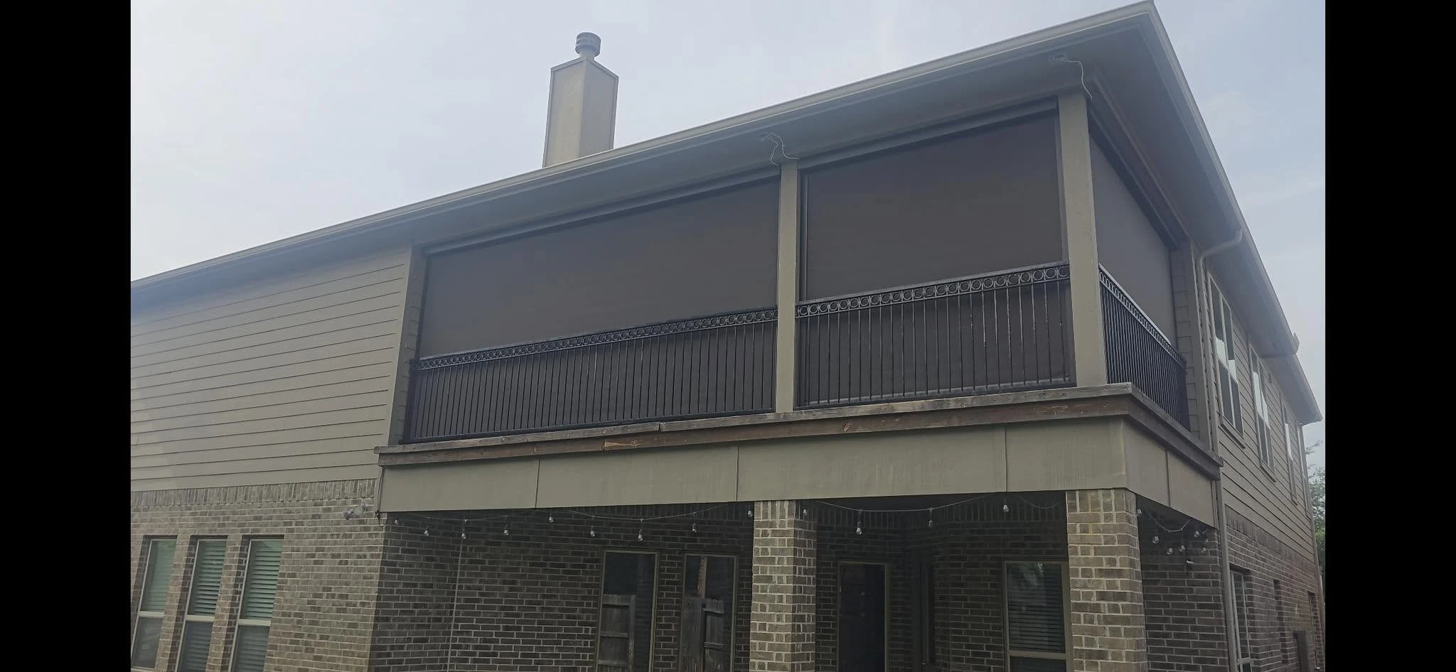 Custom outdoor shade solution on a Houston home