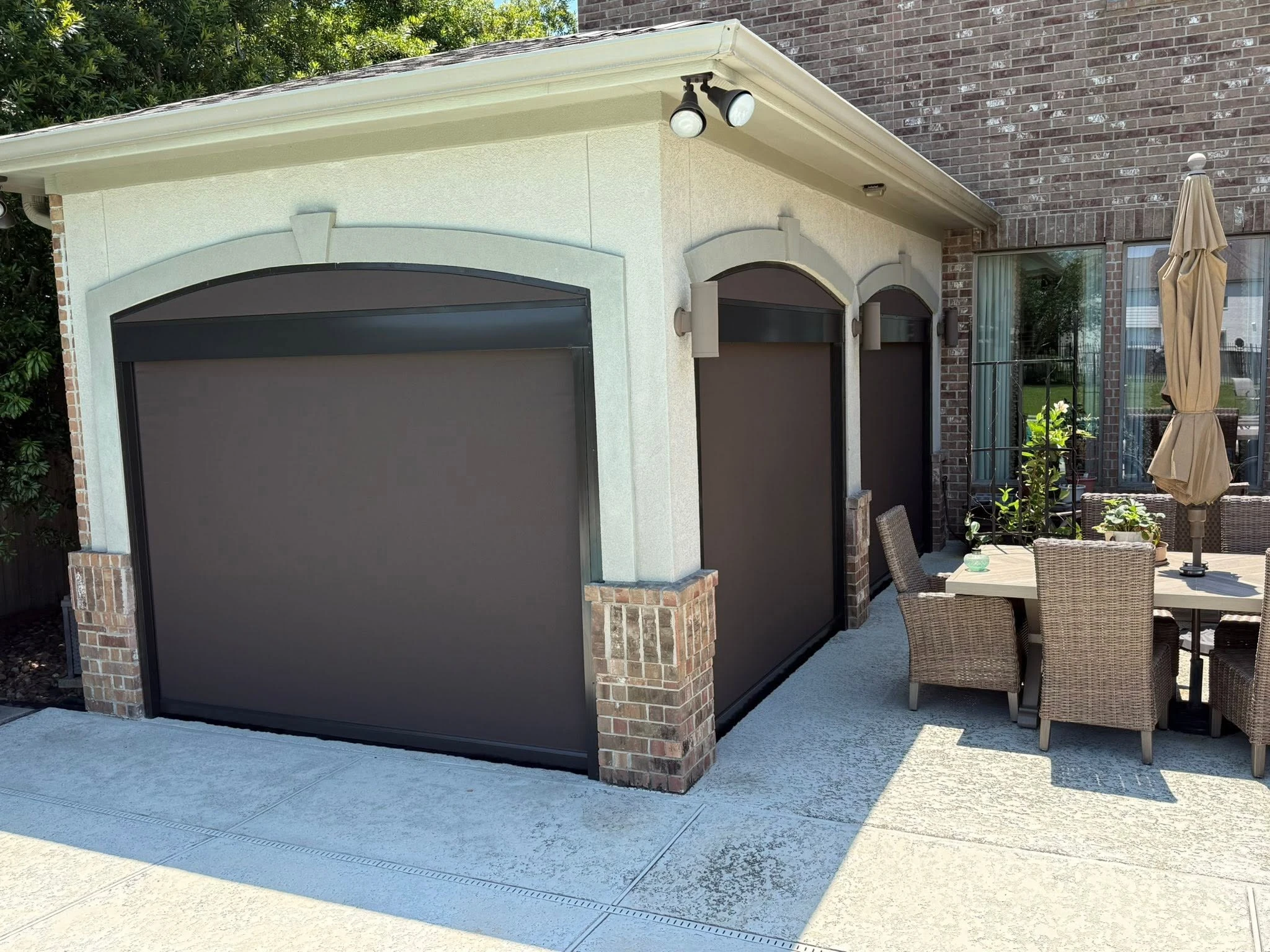 Covered patio enclosed with a custom shade system