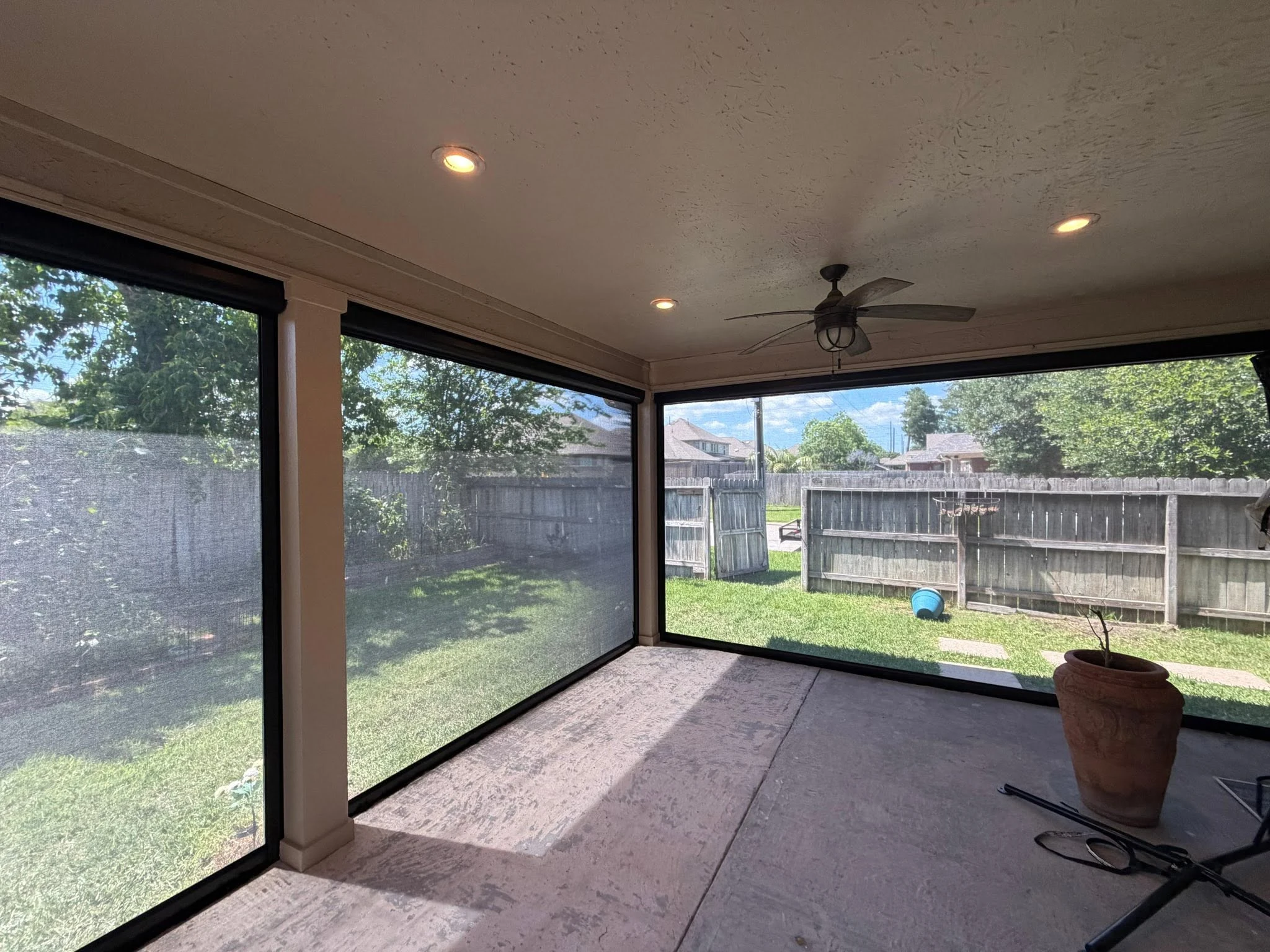 Custom motorized patio screen installation in Houston