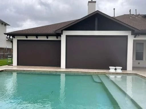Outdoor living space shaded by a custom patio system
