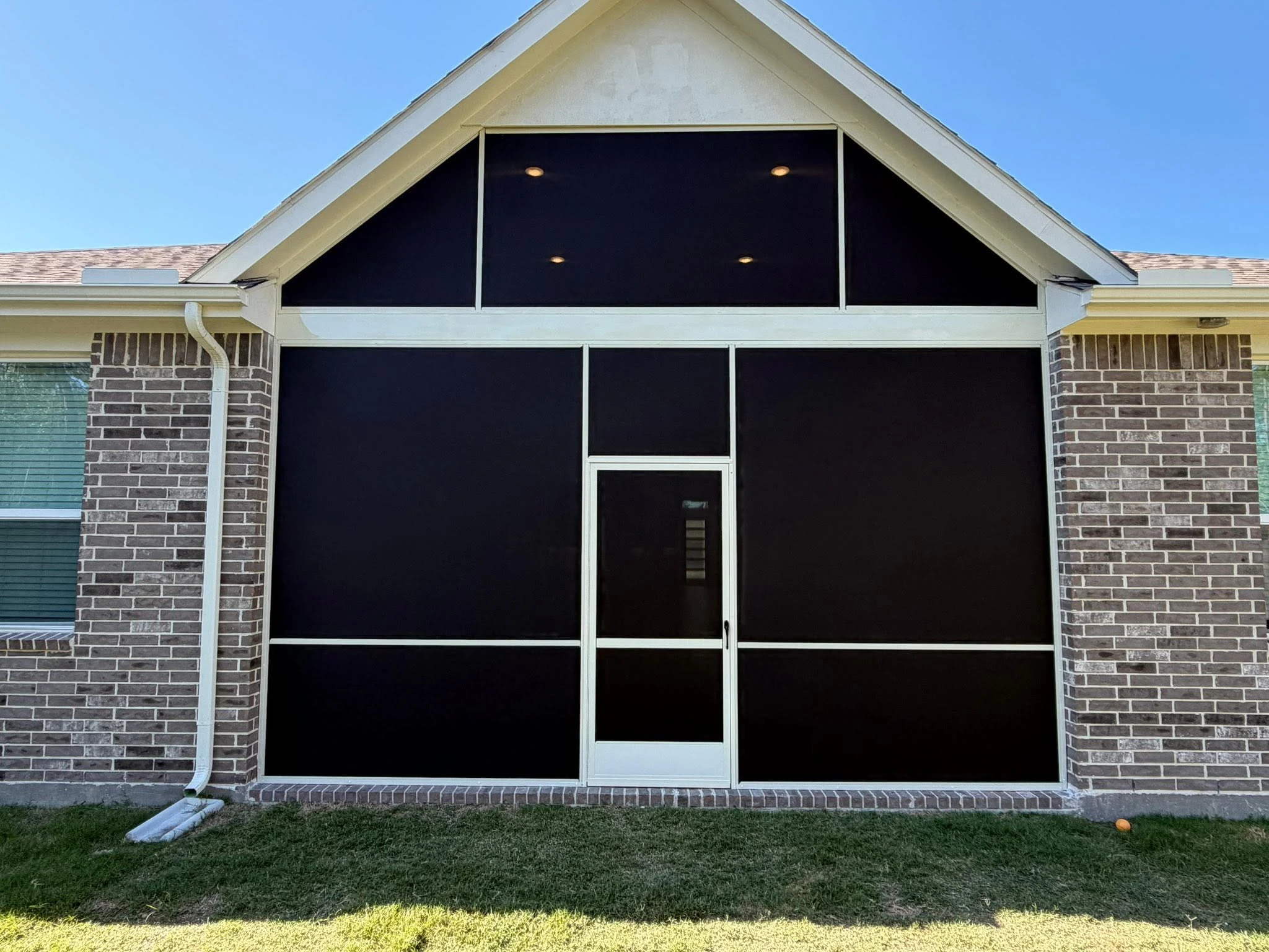 Custom outdoor shade solution on a Houston home