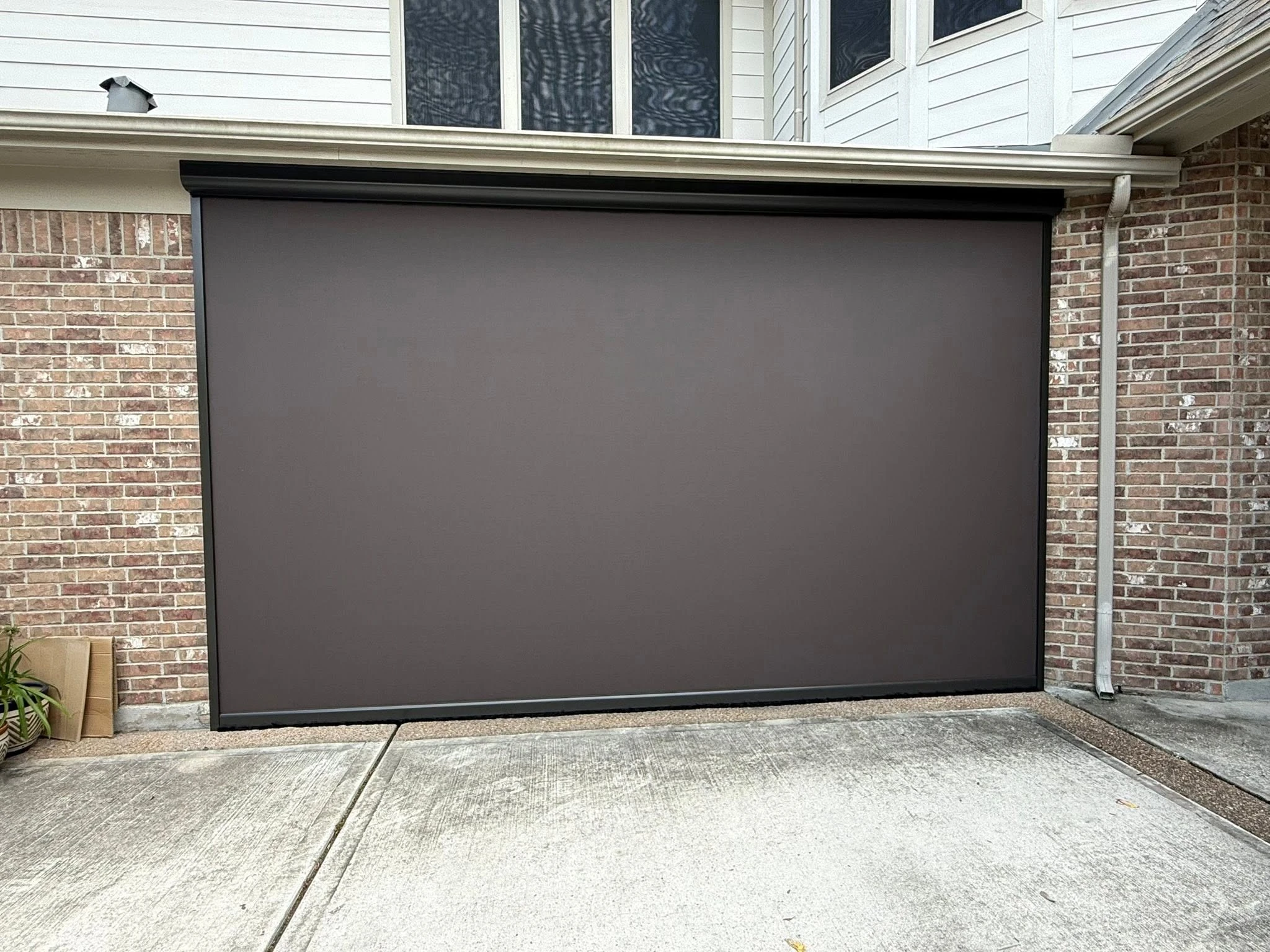 Custom outdoor shade solution on a Houston home