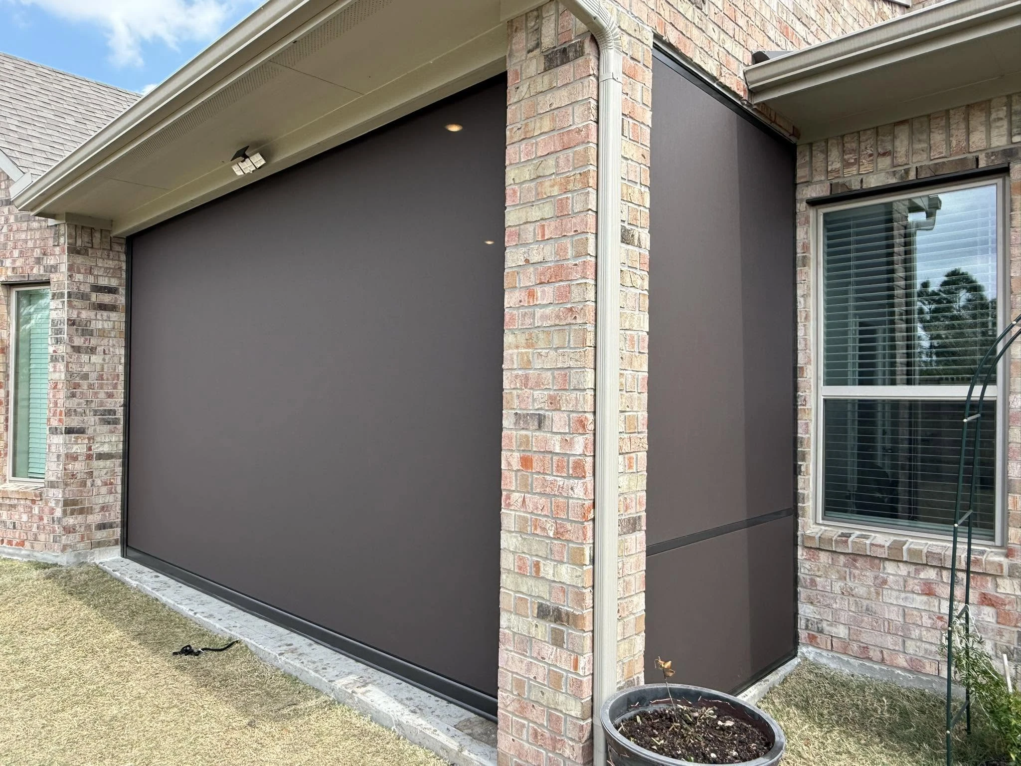 Custom outdoor shade solution on a Houston home