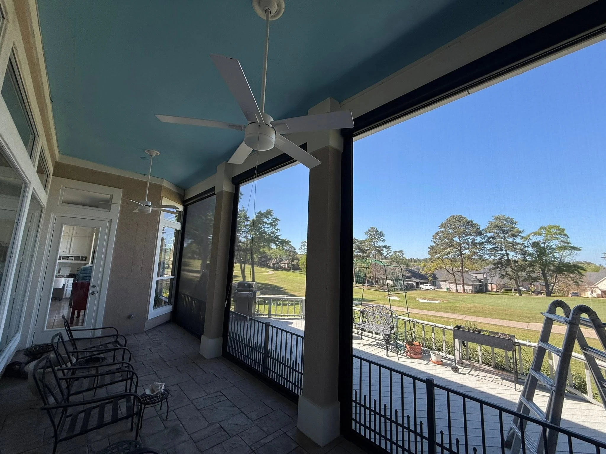 Custom motorized patio screen installation in Houston