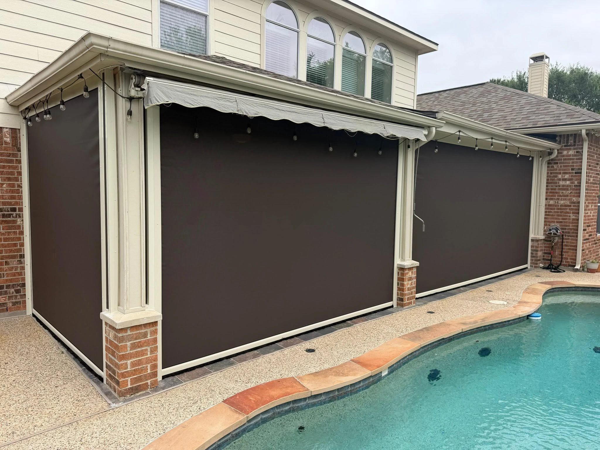 Custom motorized patio screen installation in Houston