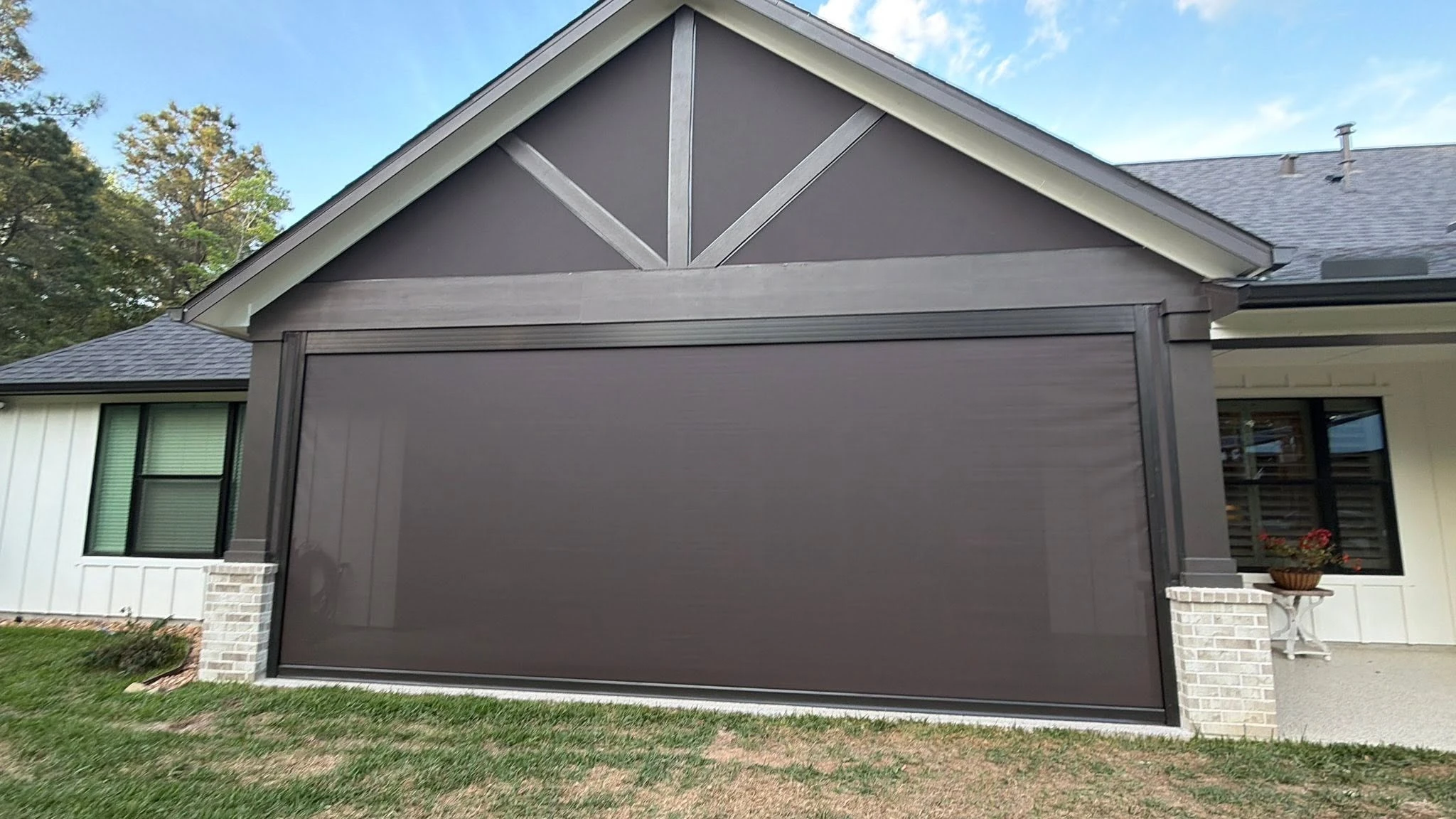 Covered patio enclosed with a custom shade system