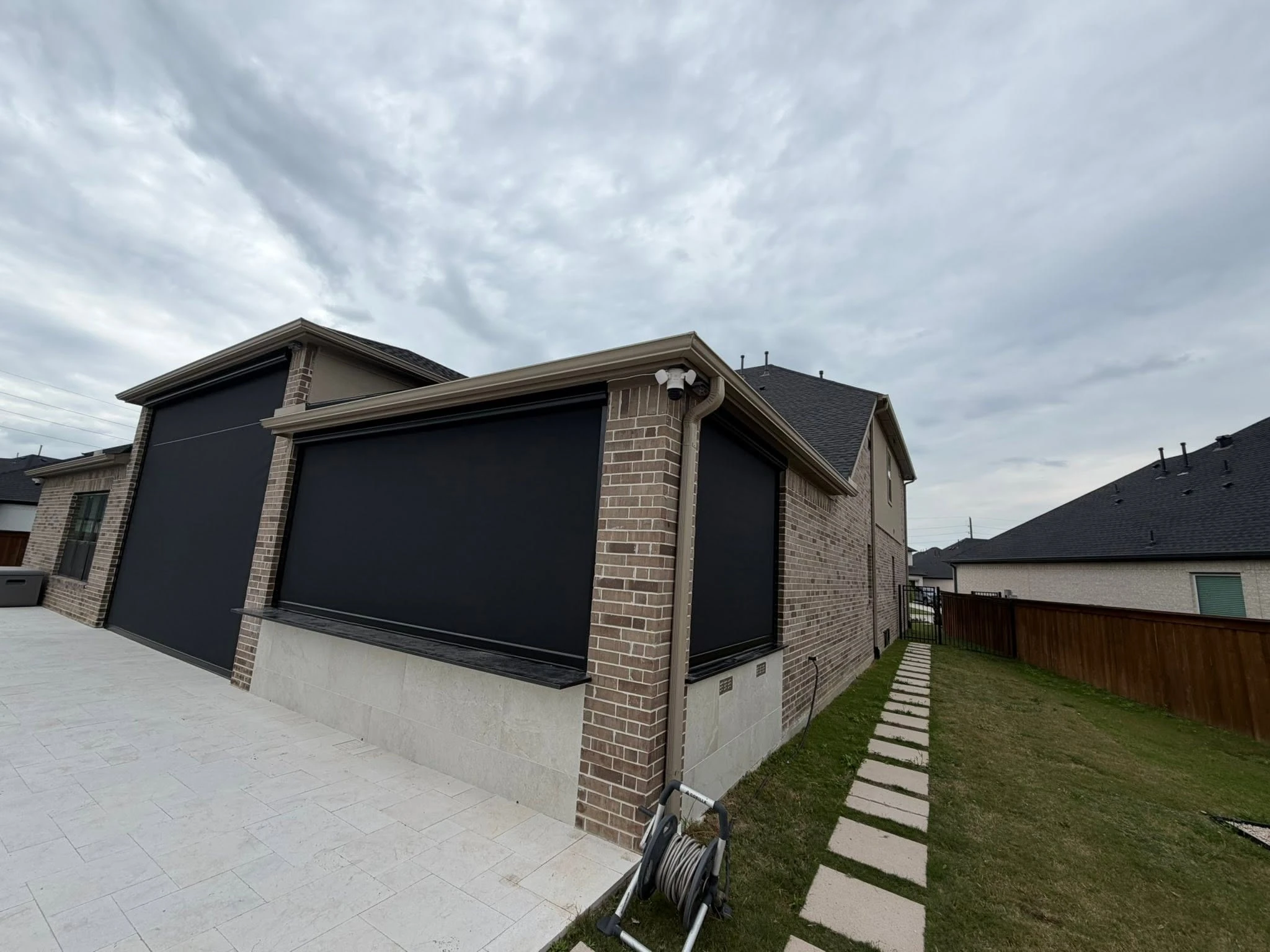 Custom motorized patio screen installation in Houston