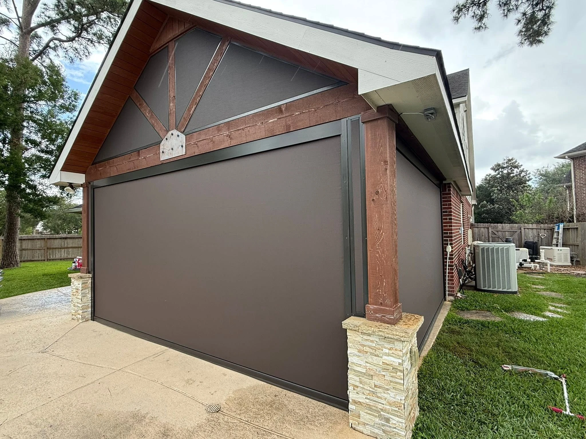 Custom motorized patio screen installation in Houston
