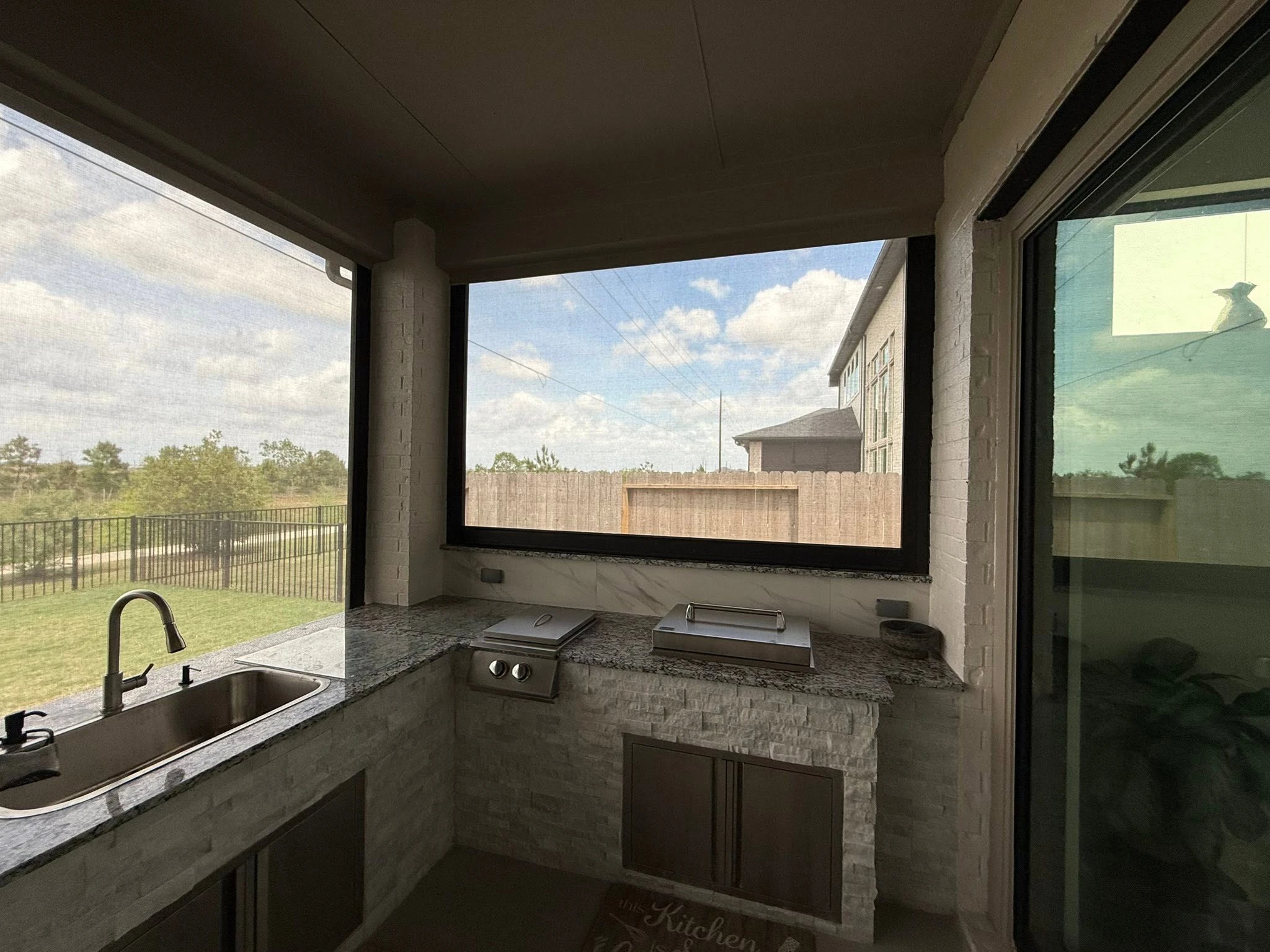 Custom outdoor shade solution on a Houston home