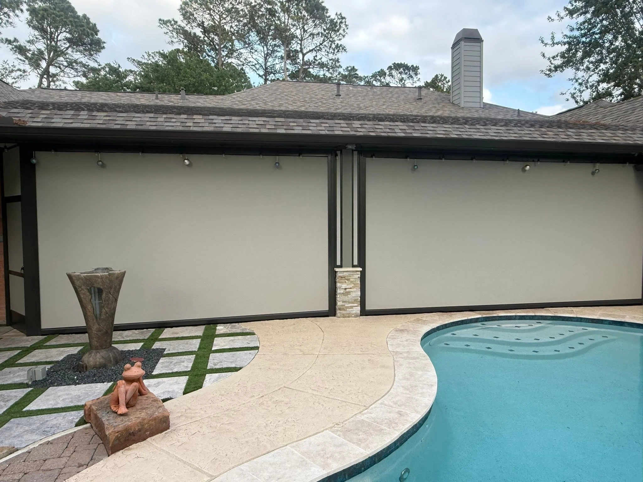 Patio shade system installed on a Houston backyard