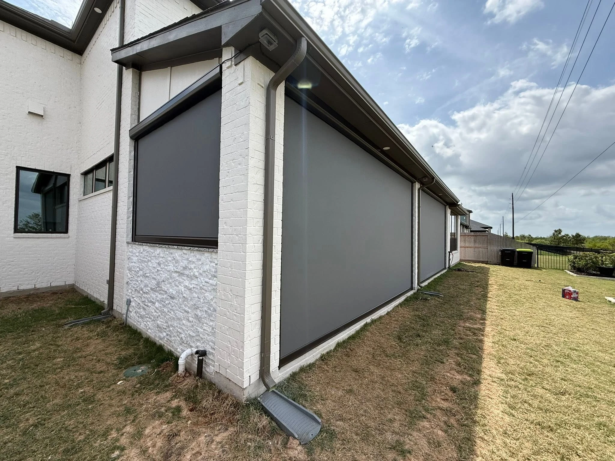 Custom motorized patio screen installation in Houston