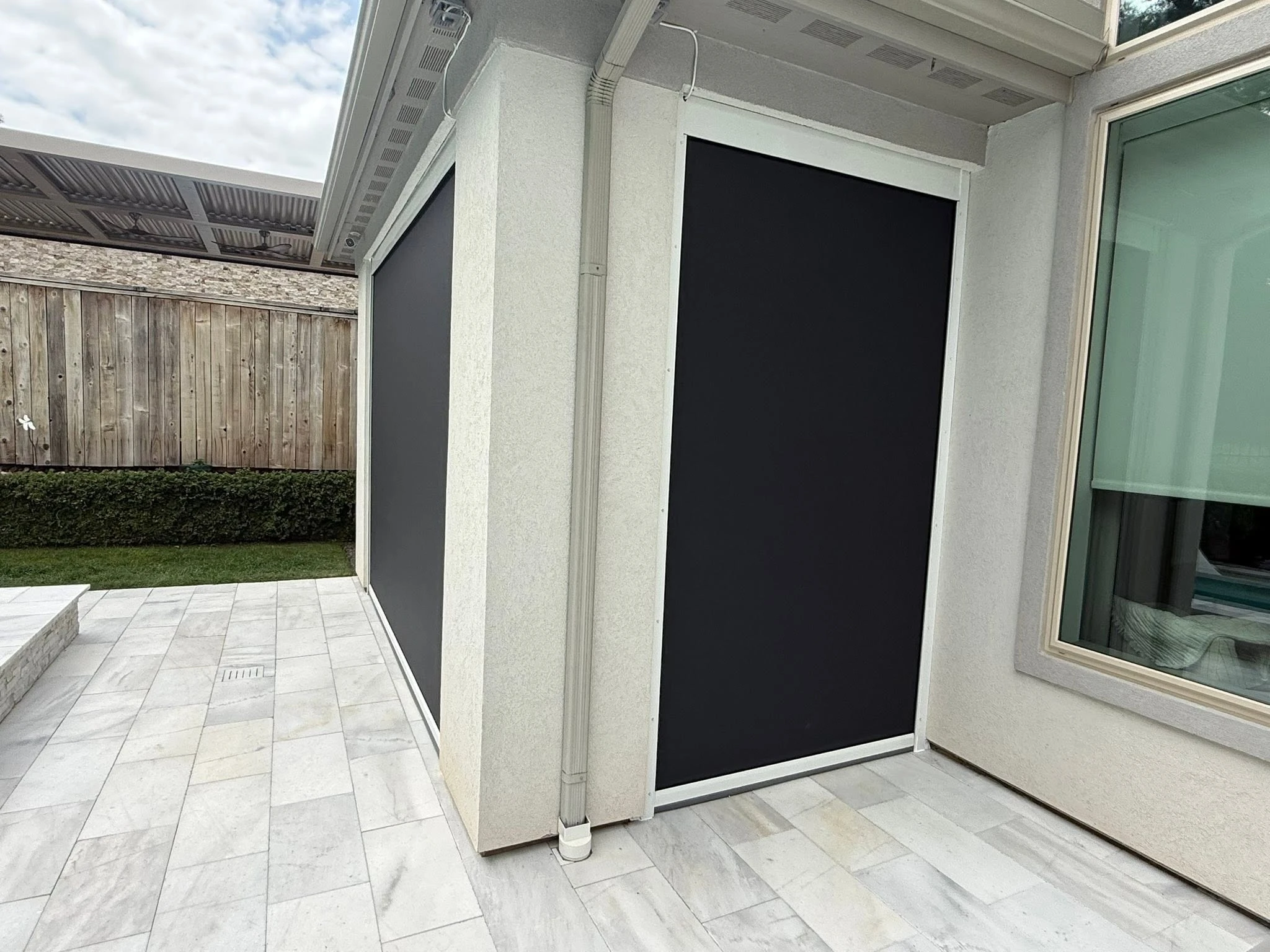 Custom outdoor shade solution on a Houston home
