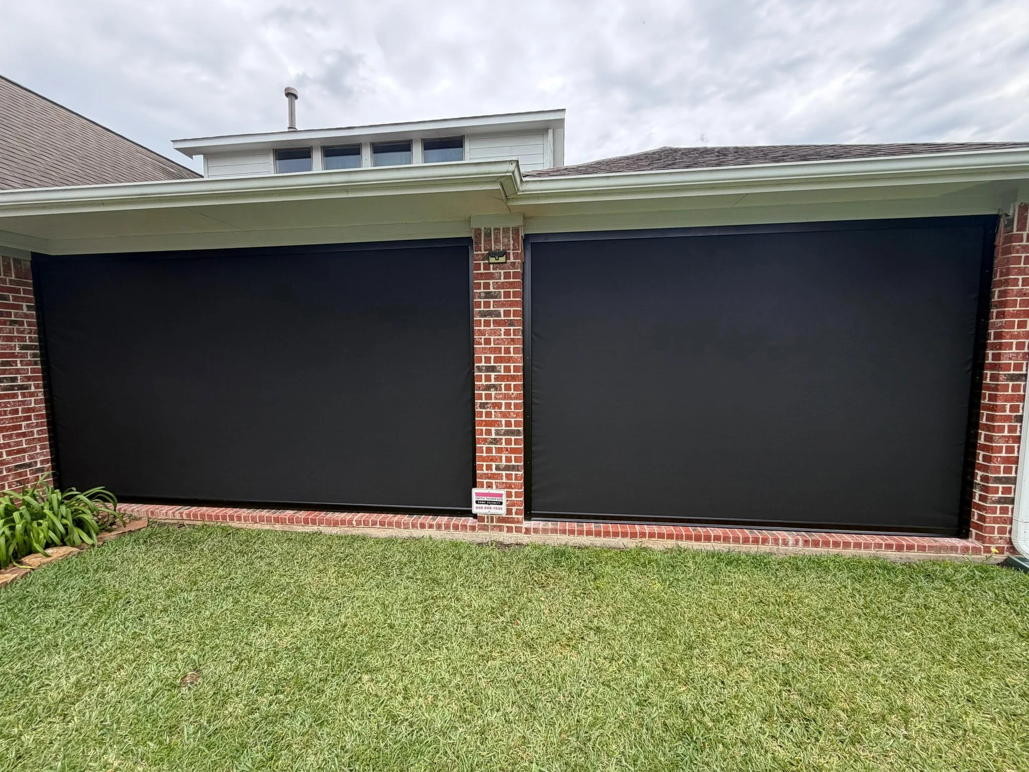 Covered patio enclosed with a custom shade system