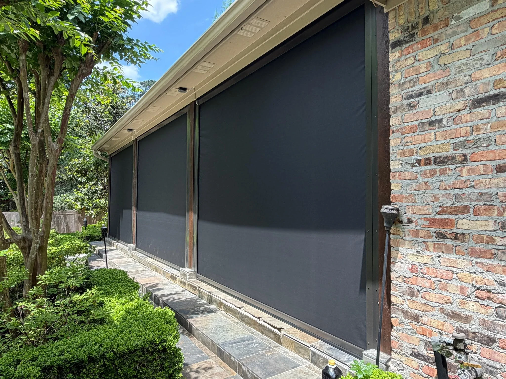 Custom outdoor shade solution on a Houston home