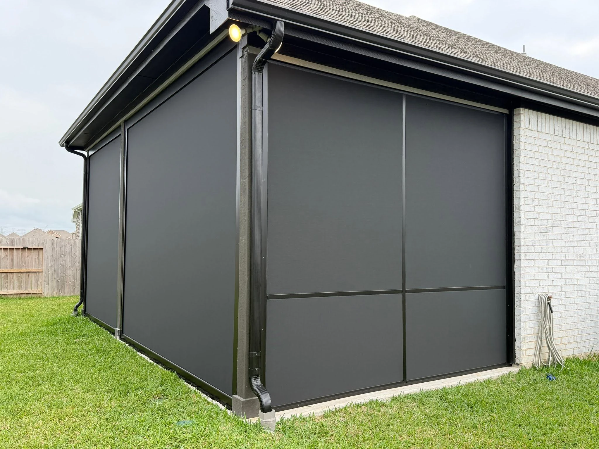 Custom motorized patio screen installation in Houston