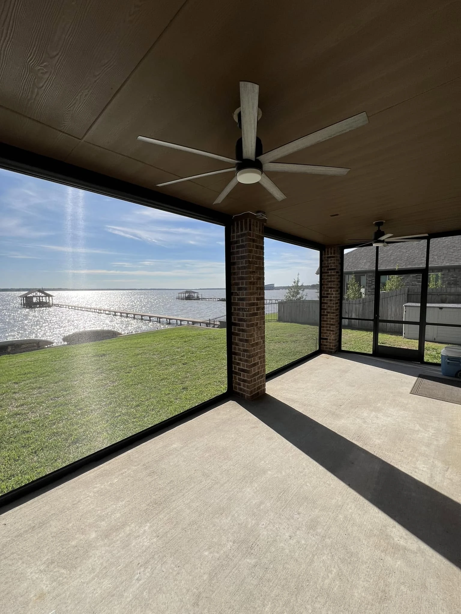 Custom-built fixed patio screen enclosure