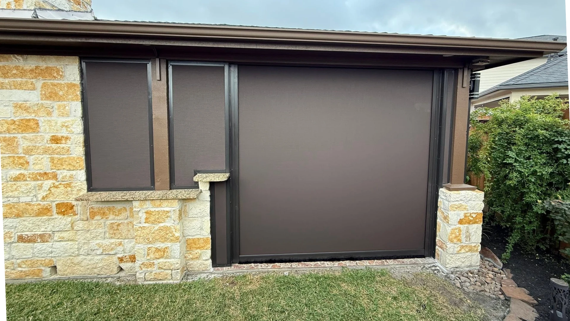 Fixed patio enclosure built to an irregular shape and angle