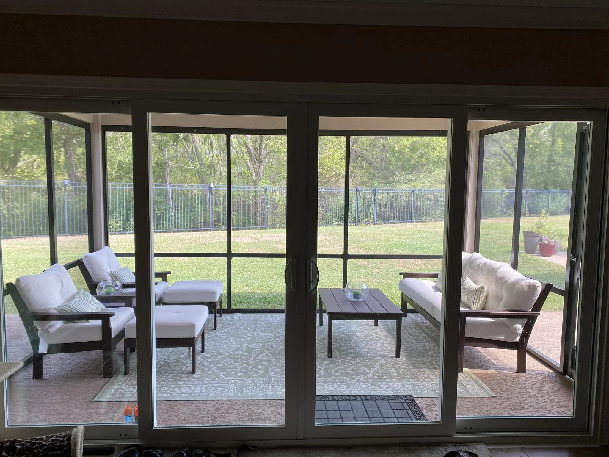 Fixed screen patio enclosure on a Houston outdoor living space