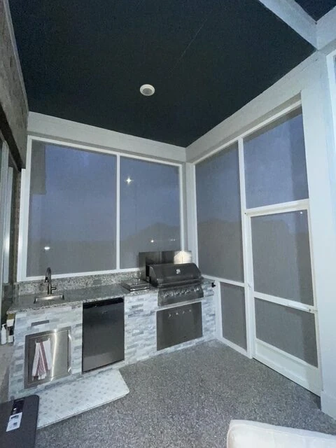 Screened patio enclosure built on-site in Houston