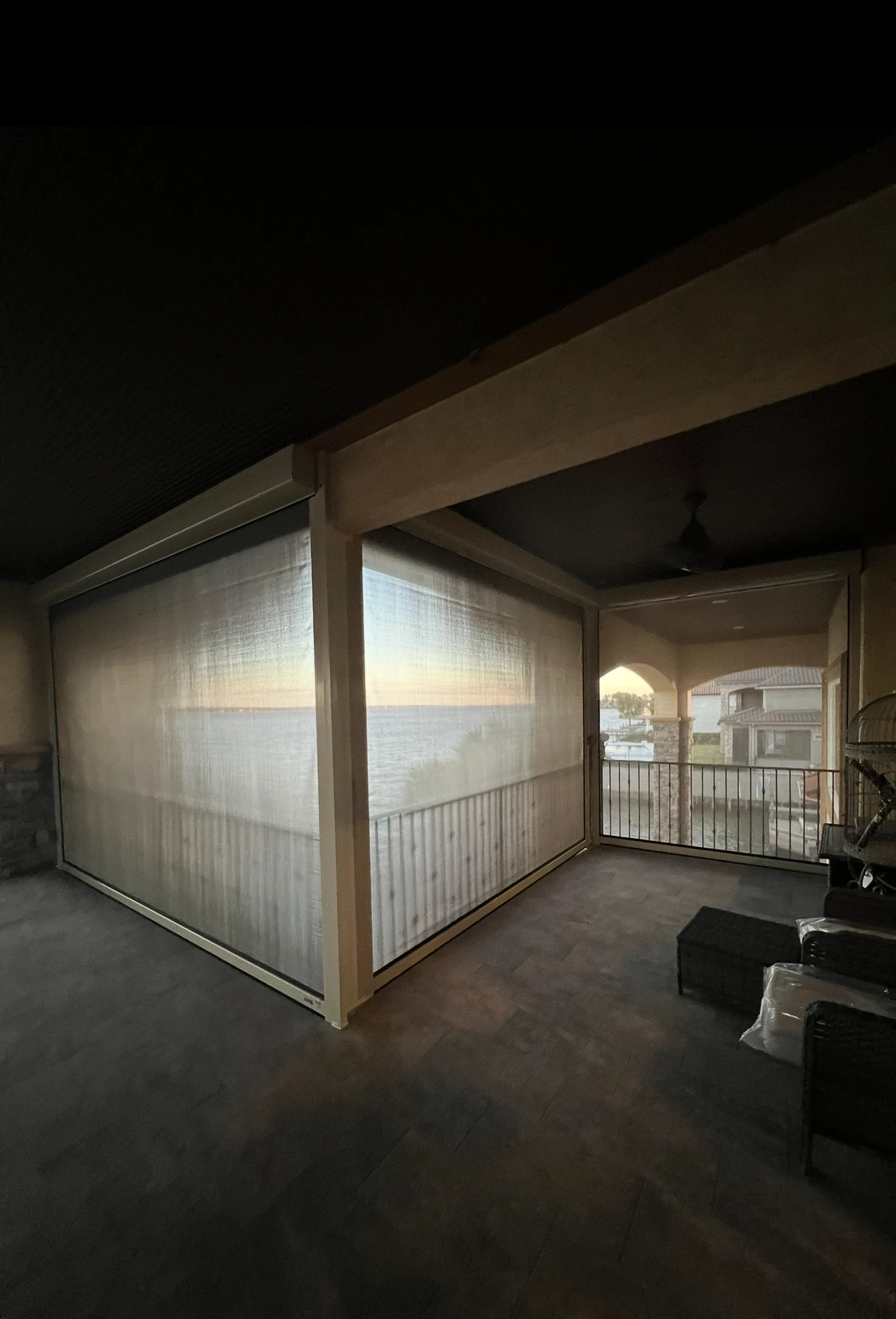 Hurricane shades installed on a Houston home for storm protection