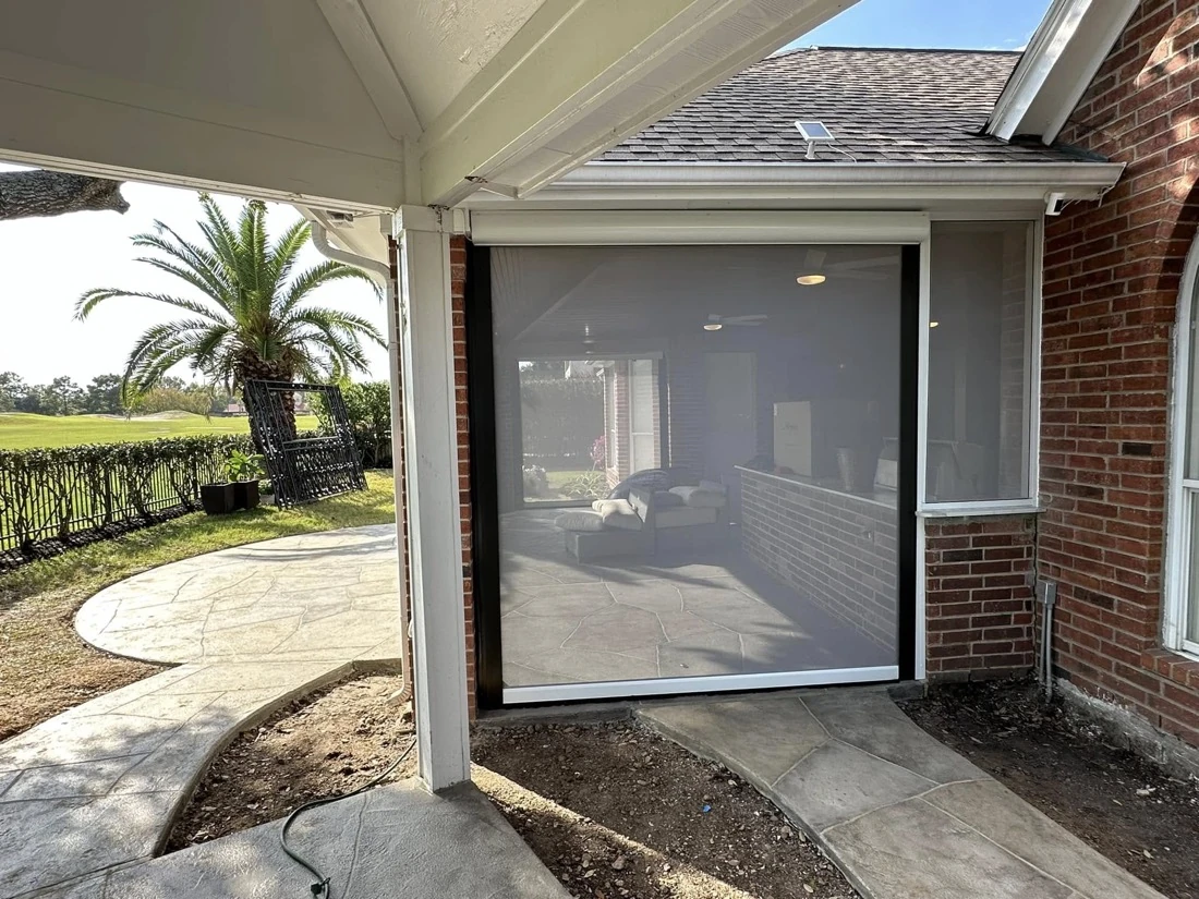 Solar screen shading a Houston patio